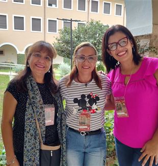 Jenny with two friends at the assembly of CL responsibles in Latin America